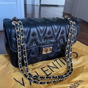 Mario by Mario Valentino. New, never used.